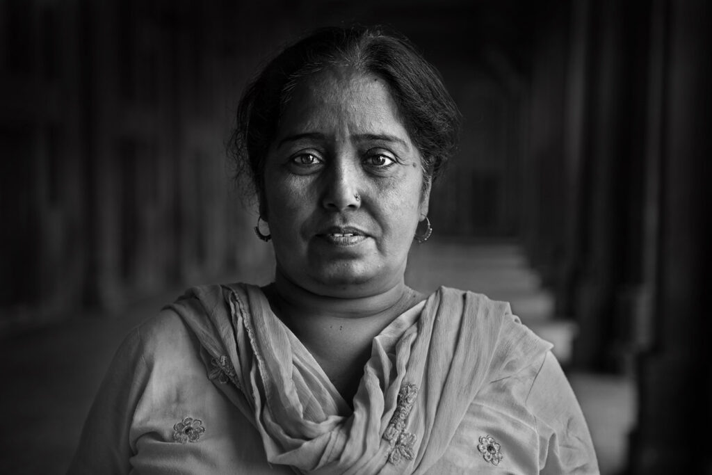 Portrait of an Indian woman Close-up portrait of an Indian woman in the street, India - stock photo