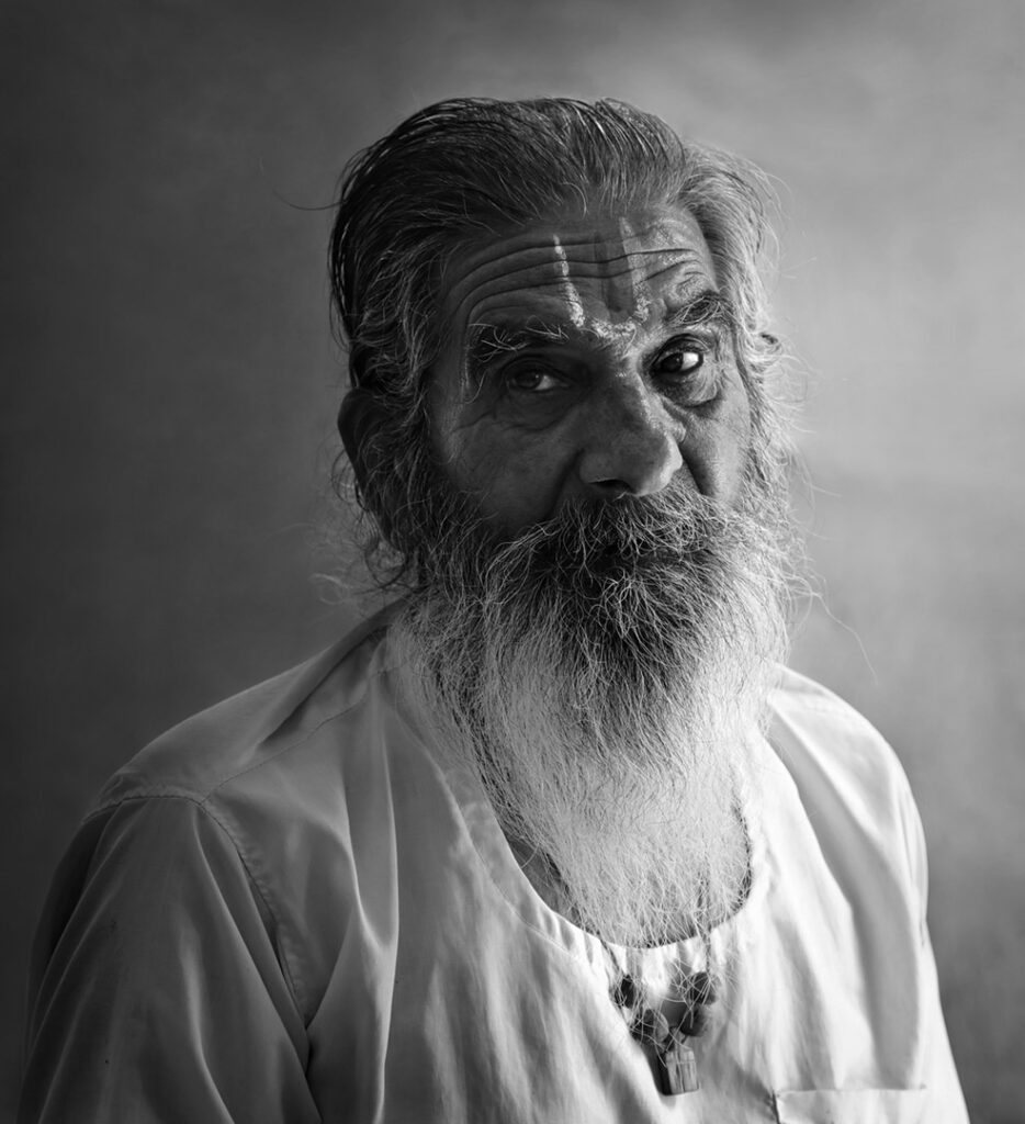 Look Close-up portrait of Indian man, Monkey Temple, Jaipur, India - stock photo