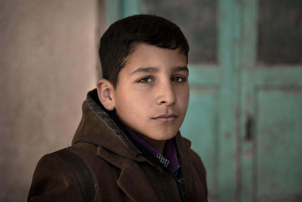 A boy Close-up portrait of Iranian boy - stock photo