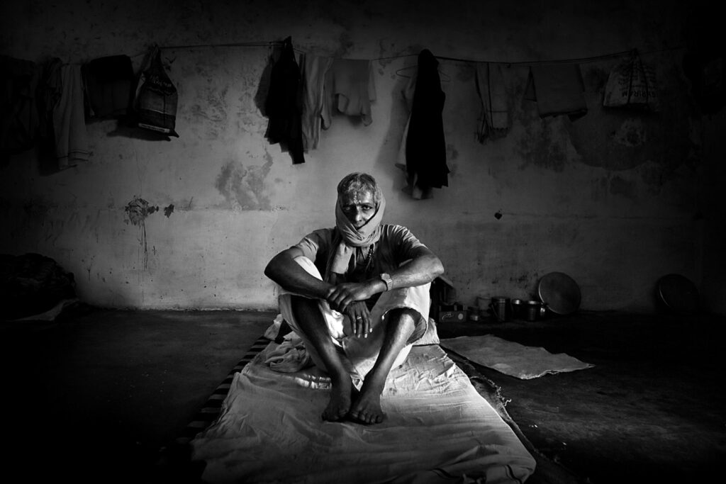 Room Portrait of an Indian man in a room, Jaipur, India - stock photo